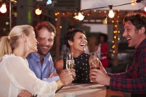 Group of friends at rooftop party